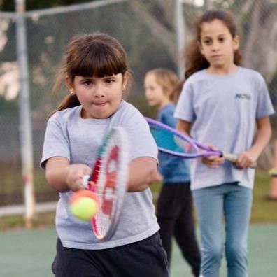 Social Tennis — Ages 7-13 · Orange & Green balls